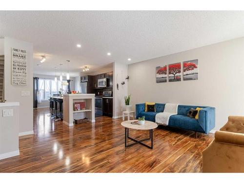 214 Cranford Park Se, Calgary, AB - Indoor Photo Showing Living Room