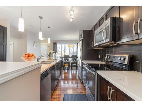 214 Cranford Park Se, Calgary, AB - Indoor Photo Showing Kitchen With Double Sink With Upgraded Kitchen