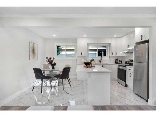 179 Flavelle Road Se, Calgary, AB - Indoor Photo Showing Kitchen With Stainless Steel Kitchen