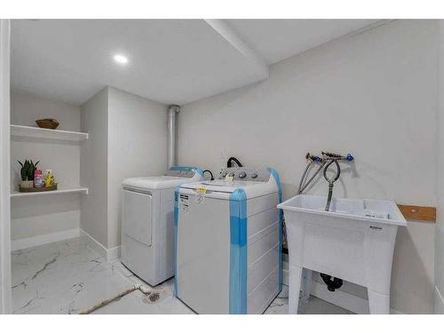 179 Flavelle Road Se, Calgary, AB - Indoor Photo Showing Laundry Room