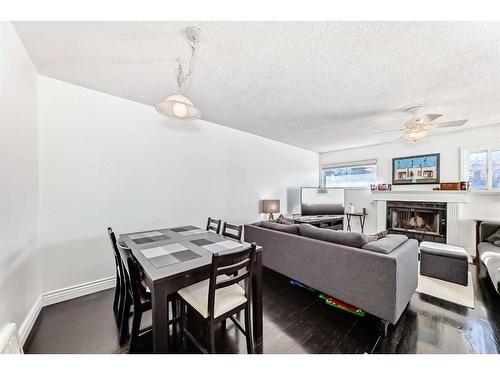 2310 14A Street Sw, Calgary, AB - Indoor Photo Showing Living Room With Fireplace