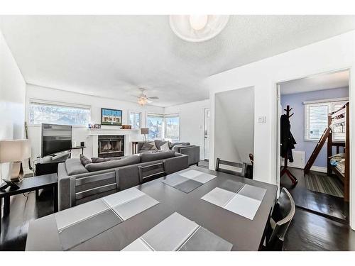 2310 14A Street Sw, Calgary, AB - Indoor Photo Showing Living Room With Fireplace