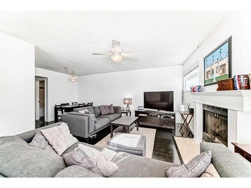 2310 14A Street Sw, Calgary, AB - Indoor Photo Showing Living Room With Fireplace