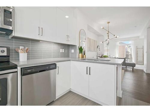 400 Walden Parade Se, Calgary, AB - Indoor Photo Showing Kitchen With Double Sink With Upgraded Kitchen