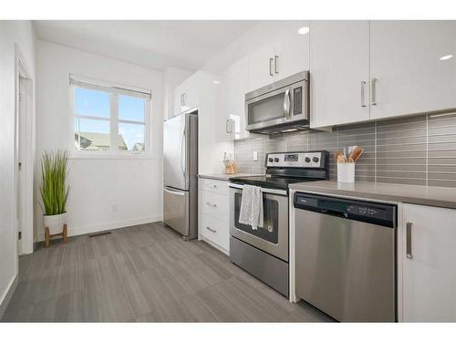 400 Walden Parade Se, Calgary, AB - Indoor Photo Showing Kitchen With Stainless Steel Kitchen With Upgraded Kitchen