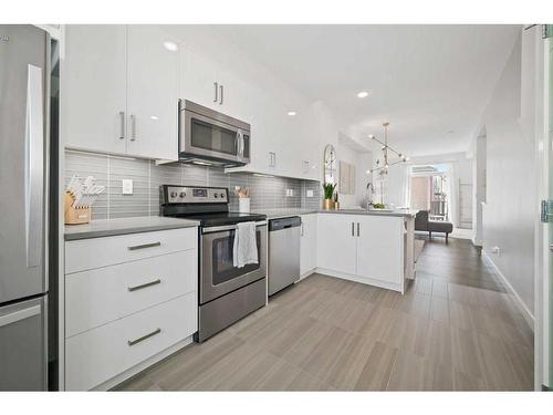 400 Walden Parade Se, Calgary, AB - Indoor Photo Showing Kitchen With Stainless Steel Kitchen With Upgraded Kitchen