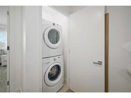 400 Walden Parade Se, Calgary, AB - Indoor Photo Showing Laundry Room