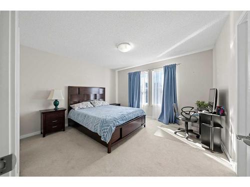 116 New Brighton Grove Se, Calgary, AB - Indoor Photo Showing Bedroom