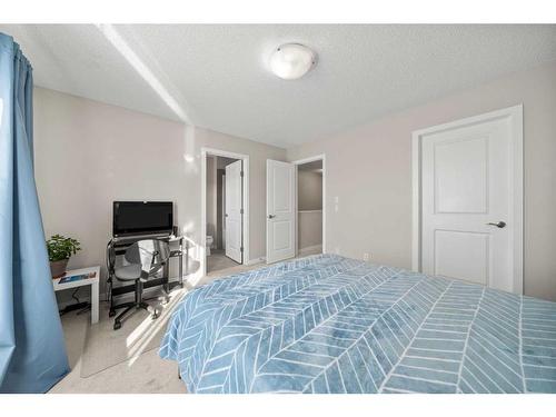 116 New Brighton Grove Se, Calgary, AB - Indoor Photo Showing Bedroom