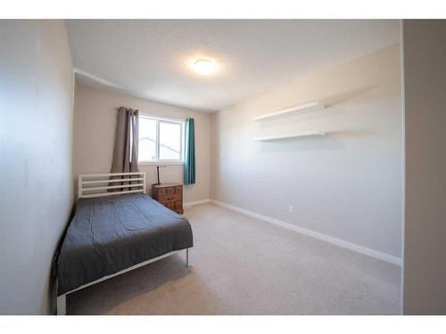 116 New Brighton Grove Se, Calgary, AB - Indoor Photo Showing Bedroom