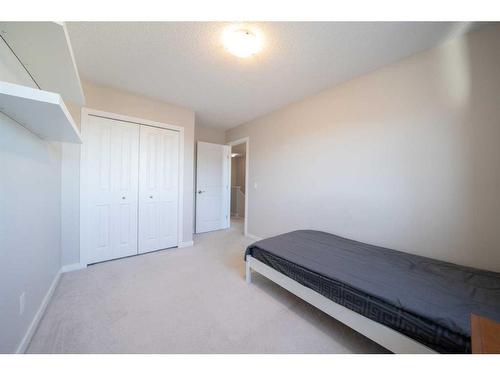 116 New Brighton Grove Se, Calgary, AB - Indoor Photo Showing Bedroom