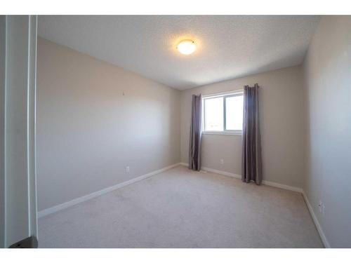 116 New Brighton Grove Se, Calgary, AB - Indoor Photo Showing Other Room