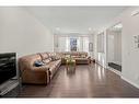 116 New Brighton Grove Se, Calgary, AB  - Indoor Photo Showing Living Room 