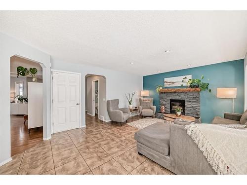 95 Tuscany Hills Park Nw, Calgary, AB - Indoor Photo Showing Living Room With Fireplace