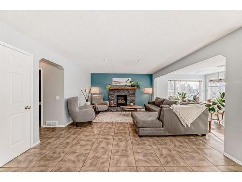 95 Tuscany Hills Park Nw, Calgary, AB - Indoor Photo Showing Living Room With Fireplace