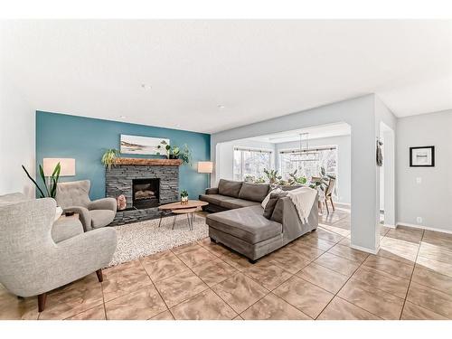 95 Tuscany Hills Park Nw, Calgary, AB - Indoor Photo Showing Living Room With Fireplace