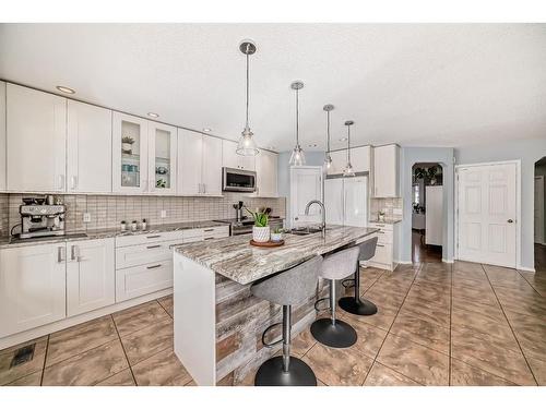 95 Tuscany Hills Park Nw, Calgary, AB - Indoor Photo Showing Kitchen With Upgraded Kitchen