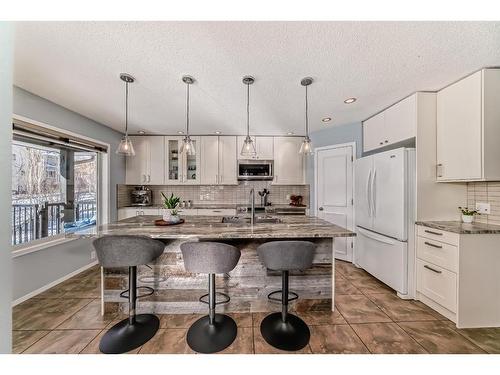 95 Tuscany Hills Park Nw, Calgary, AB - Indoor Photo Showing Kitchen With Upgraded Kitchen