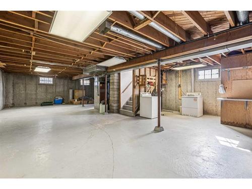 13 Manor Road Sw, Calgary, AB - Indoor Photo Showing Basement