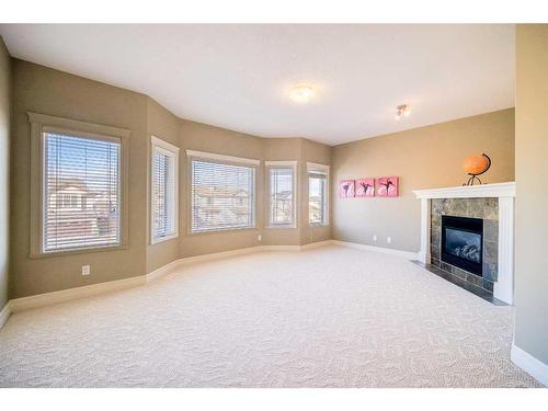 39 Weston Rise Sw, Calgary, AB - Indoor With Fireplace