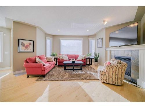 39 Weston Rise Sw, Calgary, AB - Indoor Photo Showing Living Room With Fireplace