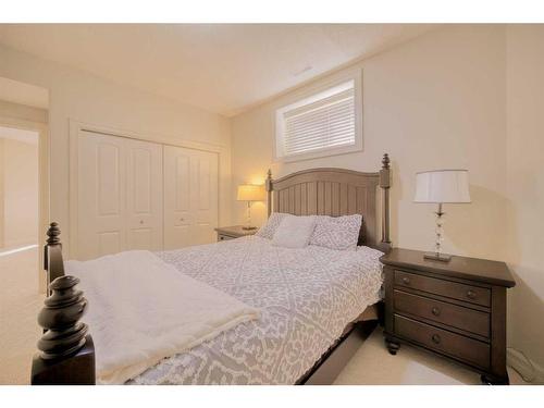 39 Weston Rise Sw, Calgary, AB - Indoor Photo Showing Bedroom