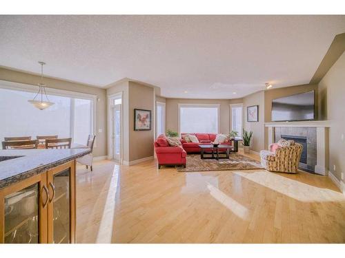 39 Weston Rise Sw, Calgary, AB - Indoor Photo Showing Other Room With Fireplace