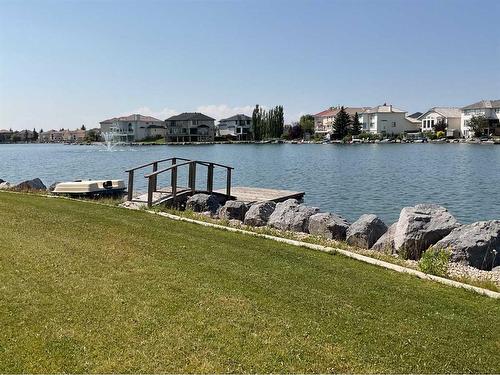 128 Coral Shores Cape Ne, Calgary, AB - Outdoor With Body Of Water With View