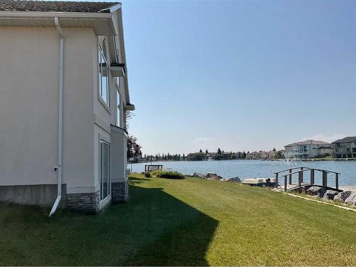 128 Coral Shores Cape Ne, Calgary, AB - Outdoor With Body Of Water With View