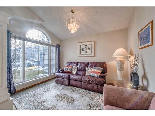 128 Coral Shores Cape Ne, Calgary, AB - Indoor Photo Showing Living Room