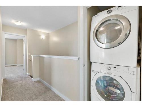 16 Redstone Circle Ne, Calgary, AB - Indoor Photo Showing Laundry Room