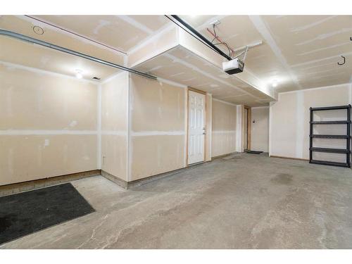 16 Redstone Circle Ne, Calgary, AB - Indoor Photo Showing Garage