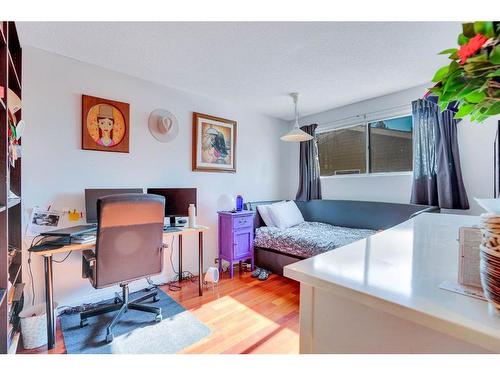 1031 Cannock Place Sw, Calgary, AB - Indoor Photo Showing Bedroom