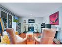 1031 Cannock Place Sw, Calgary, AB  - Indoor Photo Showing Living Room With Fireplace 