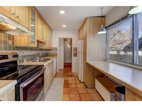 2418 Westmount Road Nw, Calgary, AB - Indoor Photo Showing Kitchen With Double Sink