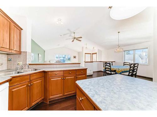 98 West Springs Way Sw, Calgary, AB - Indoor Photo Showing Kitchen With Double Sink