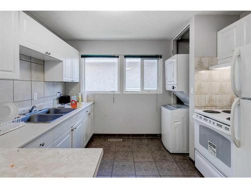 4216 Dalhousie Drive Nw, Calgary, AB - Indoor Photo Showing Kitchen With Double Sink