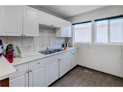 4216 Dalhousie Drive Nw, Calgary, AB - Indoor Photo Showing Kitchen With Double Sink