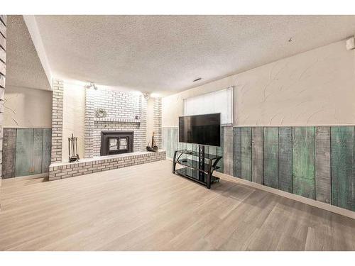 619 Templeside Road Ne, Calgary, AB - Indoor With Fireplace