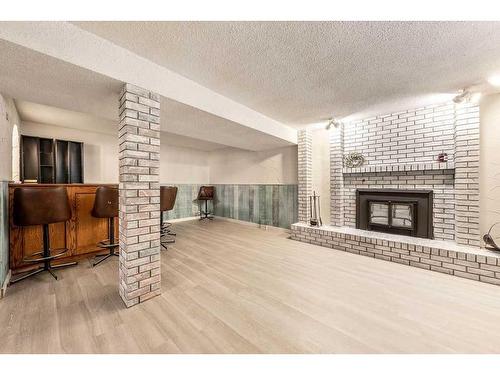 619 Templeside Road Ne, Calgary, AB - Indoor With Fireplace