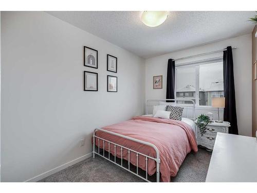 39 Masters Square Se, Calgary, AB - Indoor Photo Showing Bedroom