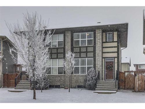 39 Masters Square Se, Calgary, AB - Outdoor With Facade