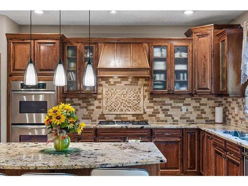 6 Rockcliff Landing Nw, Calgary, AB - Indoor Photo Showing Kitchen With Double Sink With Upgraded Kitchen