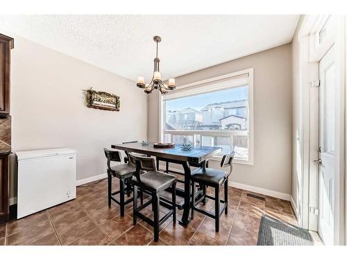 153 Chapalina Heights Se, Calgary, AB - Indoor Photo Showing Dining Room