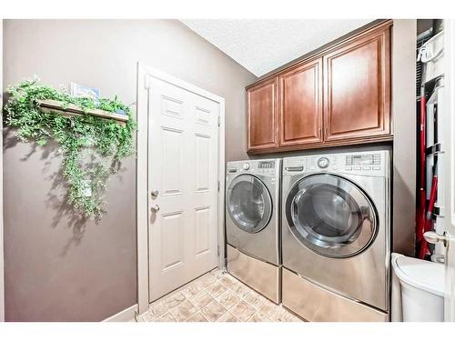 153 Chapalina Heights Se, Calgary, AB - Indoor Photo Showing Laundry Room