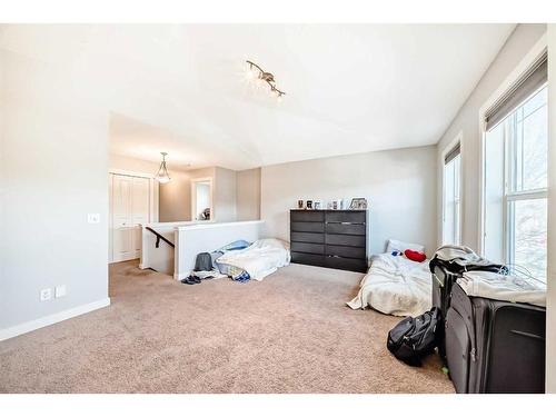 153 Chapalina Heights Se, Calgary, AB - Indoor Photo Showing Bedroom