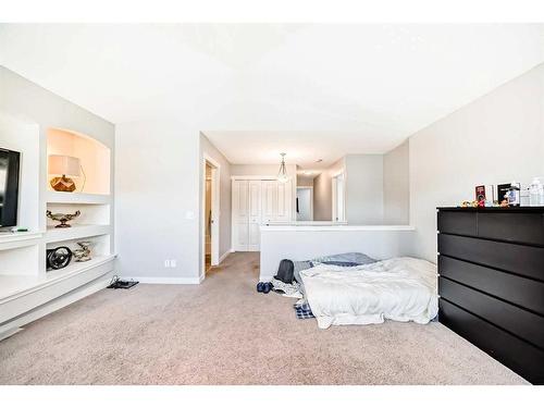 153 Chapalina Heights Se, Calgary, AB - Indoor Photo Showing Bedroom