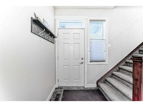 153 Chapalina Heights Se, Calgary, AB - Indoor Photo Showing Other Room