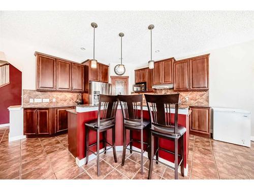 153 Chapalina Heights Se, Calgary, AB - Indoor Photo Showing Kitchen