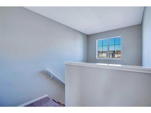 565 Panamount Boulevard Nw, Calgary, AB - Indoor Photo Showing Other Room